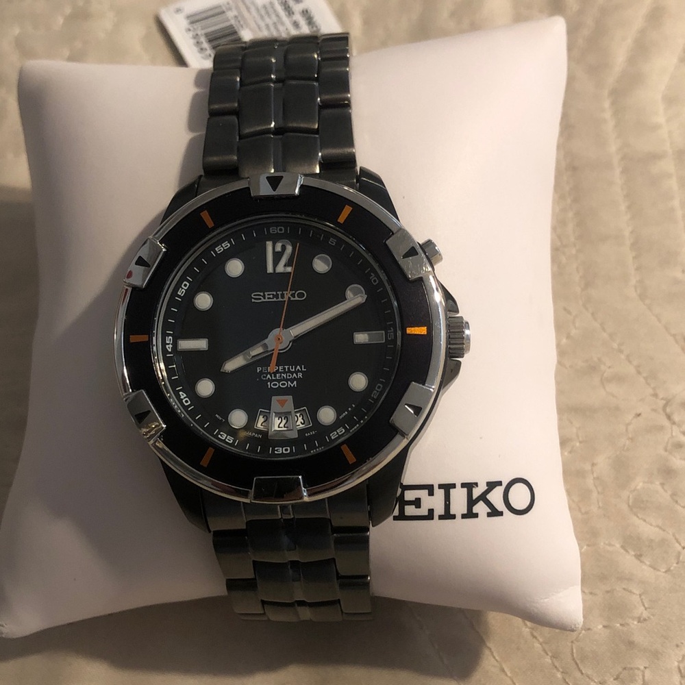 Seiko Black Dial Stainless Steel Watch with Orange Accents